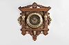 Lenzkirch Clock Co., Germany, wall clock, 8 day, time only, spring driven movement in a fancy oak case with applied brass accoutrements, brass housing for clock and carved crest, brass dial, and cut steel hands, serial #41323