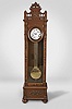 Standing Jeweler's Regulator, 8 day, time only, weight driven Swiss pinwheel movement with a gridiron lyre pendulum and sweep seconds in a carved walnut and walnut burl case with white enamel dial