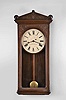 Waltham Clock Co., Waltham, Mass., "Model 35" wall clock with a weight driven 8 day timepiece movement (with deadbeat escapement and maintaining power) in a mahogany case.