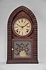 Forestville Manufacturing Co., Bristol, Conn., (J.C. Brown), 8 day, time and strike spring brass movement ripple molding round gothic or beehive shelf clock.