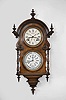 Welch, Spring, & Co., Forestville, Conn., "Wagner" hanging calendar clock with a spring driven 8 day time and strike movement and a B. B. Lewis patented perpetual calendar mechanism in a walnut case.