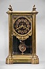 Ansonia Clock Co., New York, "Symbol Extra", 8 day, time and strike spring brass movement crystal regulator shelf clock with black and gilt hard rubber dial.