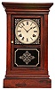 Clocks- 2 (Two): (1) Waterbury Clock Co., Waterbury, Conn. unidentified cornice top shelf clock with a spring driven 8 day time and strike movement in a rosewood veneered case. c1865; (2) Ansonia Clock Co., New York., "Dolphin" crystal regulator with a spring driven 8 day time and half hour strike movement in a polished brass and beveled glass case. c1914.