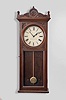 Boston Clock Co., Boston, Mass., unidentified wall clock with a weight driven 8 day timepiece movement in a cherry case.
