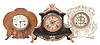 Clocks- 8 (Eight): assorted clocks including a disc pendulum 400-day clock by Becker, two porcelain case clocks by Ansonia, an enameled iron case clock by Ansonia, A "Royal Geographical Society World Clock", an 1892 wooden Columbus clock, a painted iron case clock by New Haven, and a 400 day clock signed by Endura. Also included in the lot are parts to two additional 400 day clocks.
