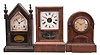 Clocks and Clock Parts- 11 (Eleven): an assortment of mantel and shelf clocks, some incomplete, including a triple decker, Gilbert mantel clock, Henry Terry half-column and splat, Seth Thomas 30-hour ogee, Sessions steeple, Ithaca calendar clock, George Owen parlor clock (case only), American Clock Co. round top mantel clock, New Haven "Oct. Prize" (case only), "Van Zandt" cabinet clock, and a Seth Thomas cottage clock. Lot also includes four brass movements, a few dozen keys, and some pendulums.
