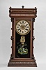 William L. Gilbert Clock Co., Winsted, Conn., "Elberon", 8 day, time and strike spring brass movement McCabe's patent calendar shelf clock.