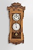 Michael Paul, Berea, Ohio, 30 hour, spring brass pendulum movement with a simple calendar miniature timepiece copy of a New Haven Clock Co. double dial calendar clock. This example is number 3 of 22.