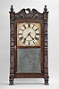 Riley Whiting, Winchester, Conn., 30 hour, time and strike weight wood movement carved column and eagle splat shelf clock.