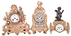 Clocks- 3 (Three) French: (1) Japy Freres & Cie, Paris, figural mantel clock, 8 day, time and strike, spring driven pendule de Paris movement in a gilt cast metal case featuring a finely dressed young man, c1865; (2) France, mantel clock, 8 day, time and strike, spring driven pendule de Paris movement in a gilt cast case with polychrome dial and panel surmounted by a boy holding a bird; (3) AD Mougin, Paris, mantel clock, 8 day, time and strike, spring driven movement with lever escapement in a gilt cast case with enamel dial, surmounted by a putto figure holding a torch, c1900.
