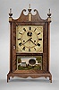 Reproduction of a Seth Thomas, Plymouth, Conn., 30 hour, time and strike weight wood off-center movement pillar & scroll shelf clock.