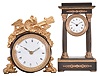 Clocks- 2 (Two) French desk: (1) Japy Freres, Paris, desk clock, 8 day, time only, spring driven movement with lever escapement in a wood drum case supported by gilt brass feet and topped with gilt brass ornament, c1905; (2) France, miniature clock, 8 day, time only, spring driven movement in a metal case in the form of an Empire portico clock, white enamel dial and blued steel Breguet style hands, c1915.