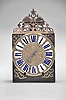 France, Comtoise clock, 8 day, time and strike, weight driven movement, verge escapement, thread suspension with rear-hanging pendulum in an iron post and plate frame, cast brass dial with royal symbols including a crown resting on the earth and profile of a young Louis XV or his son The Dauphin, white enamel cartouches with blue Roman numerals, single iron hand, four flat brass spandrels, topped by pierced flat brass fronton, mid 18th Century.