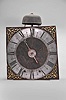 France, oversize Comtoise clock, 8 day, time and strike, weight driven movement with verge escapement, thread suspension with rear-hanging pendulum in an iron post and plate frame, 14 inch pewter chapter ring with Roman numerals, pierced brass spandrels, single iron hand in the form of a fleur de lis.