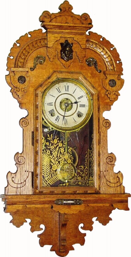 C.1905, Seth Thomas Clock Co., "King Bee" 8-day time/strike/alarm Oak hanging gingerbread clock, in excellent restored condition. — Antique Clocks Price Guide