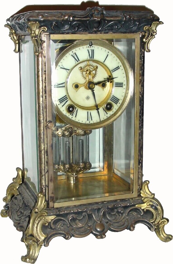 C.1917, Ansonia Clock Co., "Peer", 8-day time/strike crystal regulator, all brass case. — Antique Clocks Price Guide