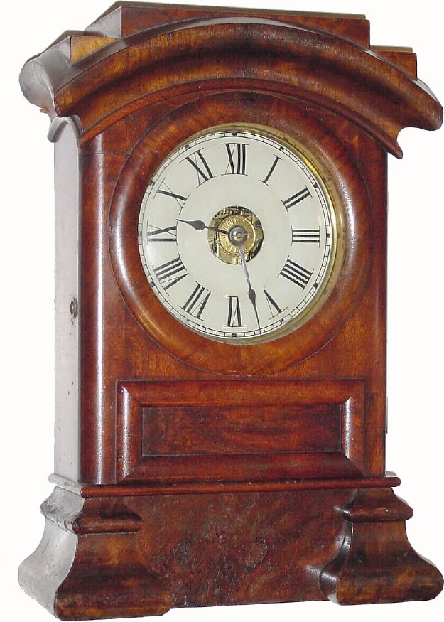 C.1885, Seth Thomas Clock Co., Thomaston, Conn., "Arch Top" 8-day time/strike/alarm mahogany shelf clock, in very good original condition. — Antique Clocks Price Guide