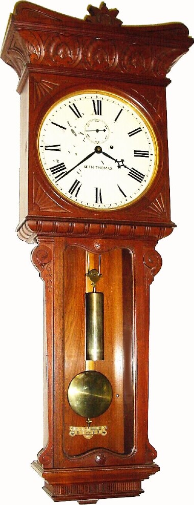 C.1905, Seth Thomas, Thomaston, Conn, "Regulator No. 7" Long, in walnut, in excellent original condition. — Antique Clocks Price Guide