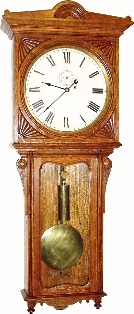 C.1905, Seth Thomas, Thomaston, Conn, "Regulator No. 8 " Short, in excellent condition, with the oak case attractively refinished to a golden caramel color. — Antique Clocks Price Guide