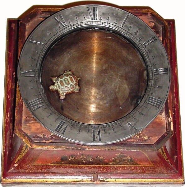 C.1890, French Mystery Clock, a Floating Turtle indicating the time, and in good original condition. — Antique Clocks Price Guide