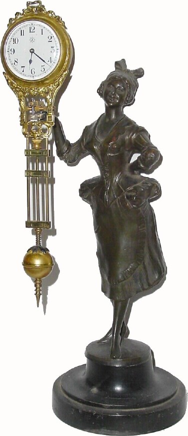 C.1910, German, Junghans, "Barmaid" Swing clock in good original condition. — Antique Clocks Price Guide