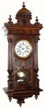 C.1900, German for the French market, a large and nicely appointed walnut wall clock in the Alt Deutsch style. — Antique Clocks Price Guide