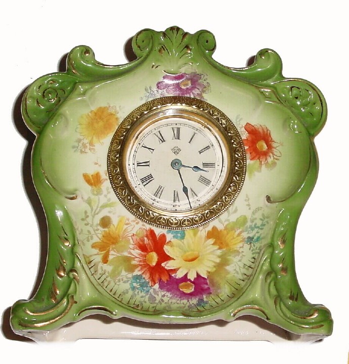 C.1904, Ansonia Clock Co., "Goblin" 30-hour Royal Bonn porcelain timepiece in very good original condition. — Antique Clocks Price Guide