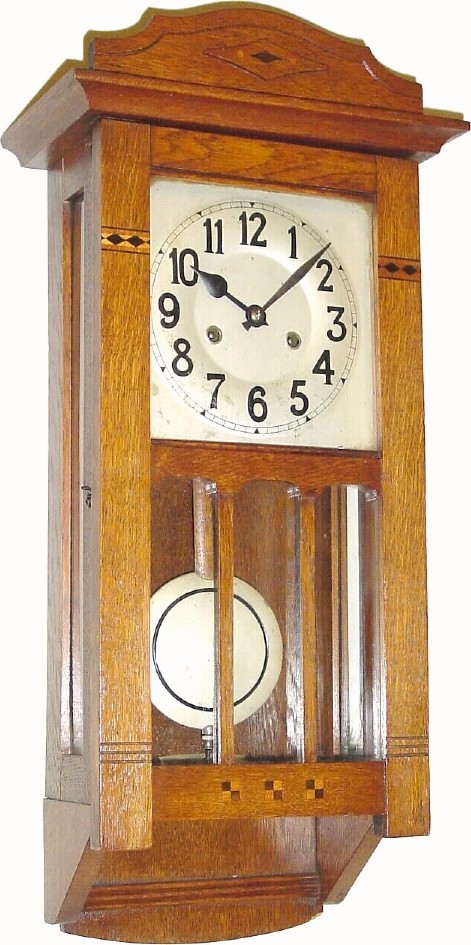 C.1915, German, Oak cased, 8-day time and strike wall clock in very good original condition. — Antique Clocks Price Guide