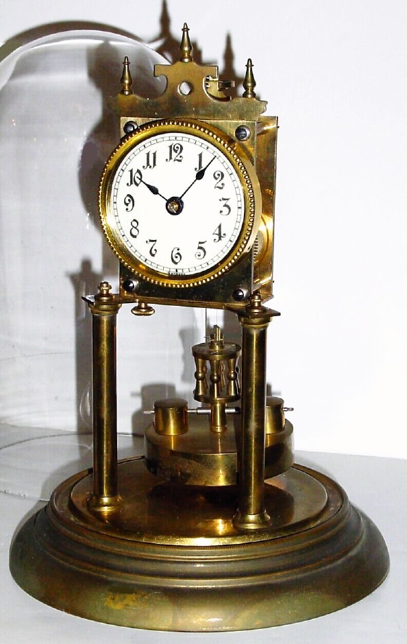 C.1905, German, Kienzle, 400 Day clock with original dome and matched number disc pendulum. — Antique Clocks Price Guide