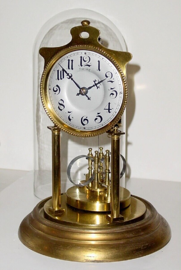 C.1902, German, Jahresuhrenfabrik, for Carp Year-Long Clock Co, unusual Art Nouveau 400 day clock with large silvered dial and compensating pendulum. — Antique Clocks Price Guide