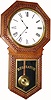 C.1911, Ingraham Clock Co., "Hartford" 8-day pressed oak long drop school regulator.