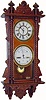 C.1891, Waterbury Clock Co., Calendar No. 36 . This is an oak double dial in excellent original condition.
