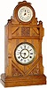 C.1885, New Haven Clock Co, very uncommon double dial, the Cabinet No. 7, in ash, and in excellent original condition.