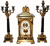 C.1900, French, Marti, Ormolu and Bronze Crystal regulator set with candelabras, and in good original condition with bright gilding and dark green bronze intact.