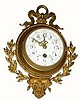 C.1900, French, Charles Hour, wall cartel clock in the style of Louis XVI.