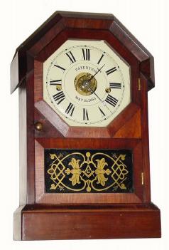 C.1863, Seth Thomas Clock Co., "Octagon Top" 30-hour time/strike/alarm shelf clock with a very nice refinished rosewood veneered case. — Antique Clocks Price Guide