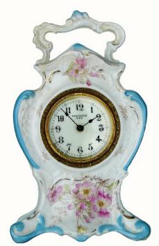 C.1905, New Haven Clock Co., Unusual thirty-hour porcelain case novelty with carrying handle. — Antique Clocks Price Guide