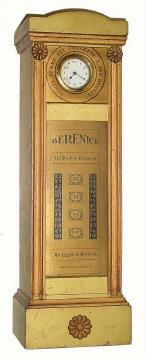 C.1925, Canadian, Mini Tall Clock, advertising Berenice, Un Parfum Egyptien. — Antique Clocks Price Guide