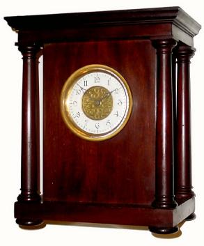 C.1905, American Clock Co., Chicago, Ill, battery operated electric timepiece. This was a company that was formed in Kansas City out of a merger of the Automatic Electric Clock Co., and the United States Pneumatic Clock Co., The movement is housed in a simple designed mahogany case with original finish. — Antique Clocks Price Guide