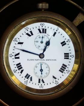 C.1930, Elgin National Watch Co., 1-day Elgin 35 Size, 21 jewel, "Father Time" ships chronometer with up/down wind indicator, and inner and outer boxes. — Antique Clocks Price Guide