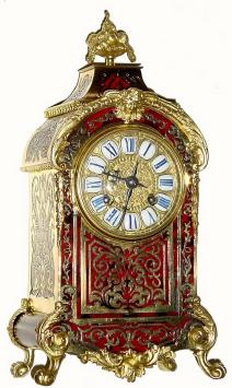 C.1915, French, for JUST, Inlaid Brass and Red Tortoise Shell clock in the style of Boulle, and in excellent original condition. — Antique Clocks Price Guide