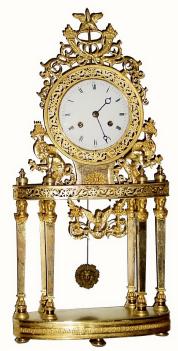 C.1820, French, Ormolu Mantel regulator in skeleton form, the two tiered case supported by 6 Egyptian style pillars. — Antique Clocks Price Guide