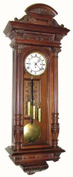 C.1880, Austrian, 3-Wt Grand Sonnerie wall clock in a walnut case with nicely carved 3/4 columns with Corinthian capitals, — Antique Clocks Price Guide