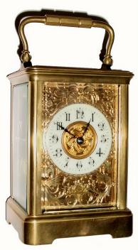 C.1900, French, Brass Cased Carriage Clock, time and strike, in a Corniche case with wonderful floral mask with sea horses. — Antique Clocks Price Guide
