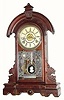 C.1883, Waterbury Clock Co., "Windham", 8-day time/strike/alarm walnut shelf clock.
