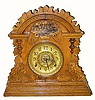C.1893, E. Ingraham and Co., "Cabinet No. 2" eight-day oak cabinet clock with alarm.