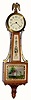 C.1930, Waltham Clock Co., 8-day lever movement miniature banjo timepiece, with stem wind knob behind lower door.
