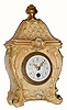 C.1900, French porcelain timepiece with handsome Rococco case and gilt brass finial.
