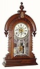 C.1885, E. Ingraham and Co., 8-day time-strike-alarm shelf clock, with restorations.