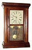 C.1845, Sperry and Shaw, 10 Maiden Lane, New York, 8-day time/strike rosewood veneer and ripple shelf clock.